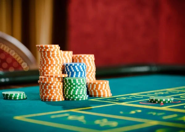 Mobile phone displaying live casino interface